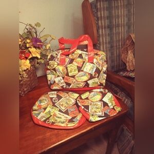 Three piece small travel set, iridescent orange vinyl and travel themed fabric